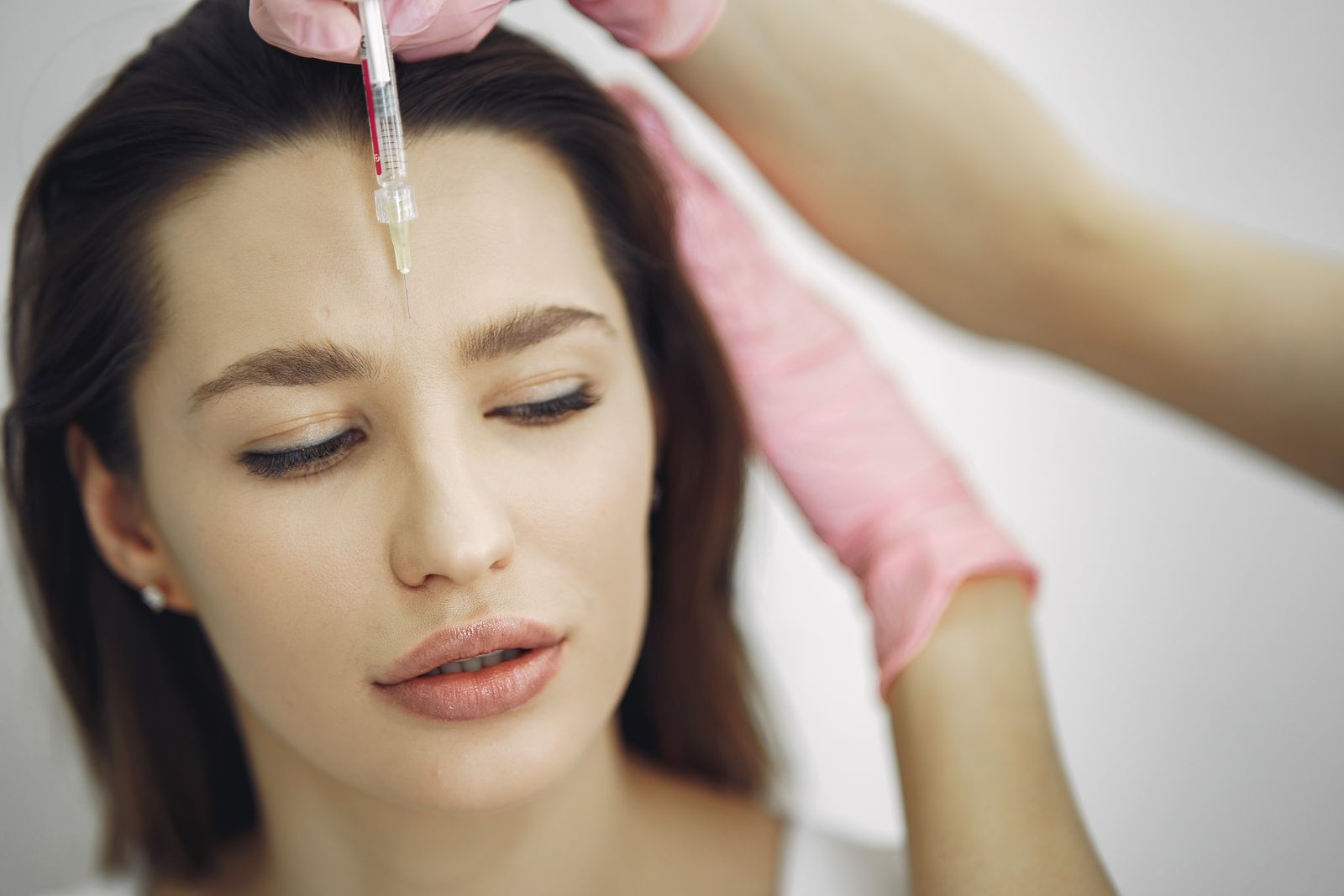 A client receiving Botox from a licensed PA